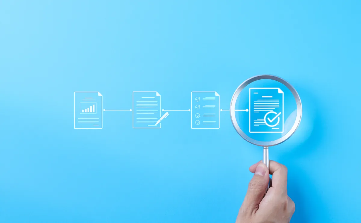 Analytics auditor verifying data integrity and tracking accuracy across platforms