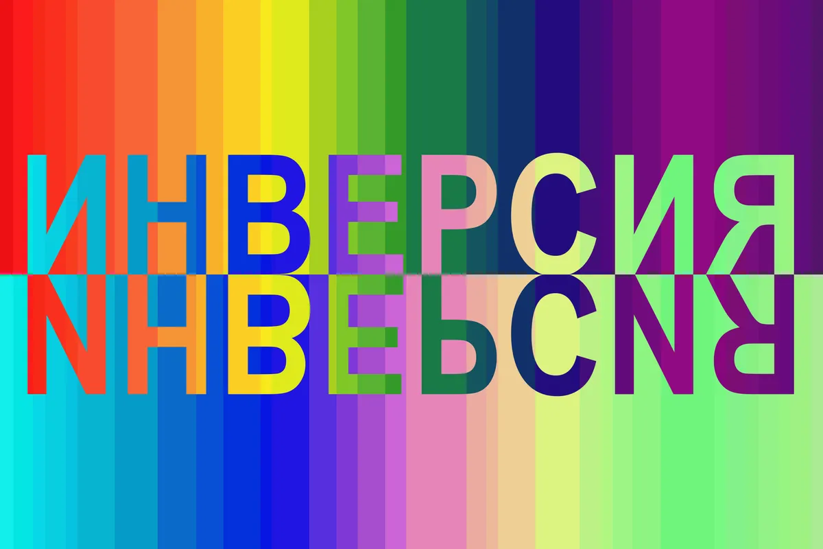 Designer creating a cohesive visual identity system with colors, typography, and iconography